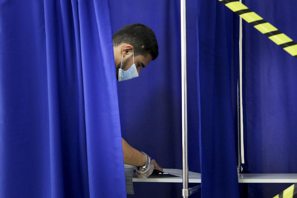 Comunistas y observadores denuncian compra de votos y otras violaciones en elecciones rusas